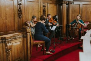 quartet playing at Gay wedding at London Islington Town Hall.