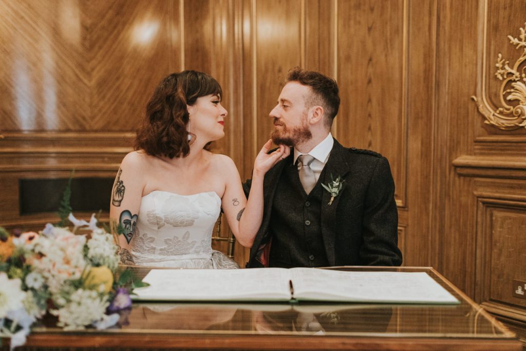 Bride and groom look into each other eyes