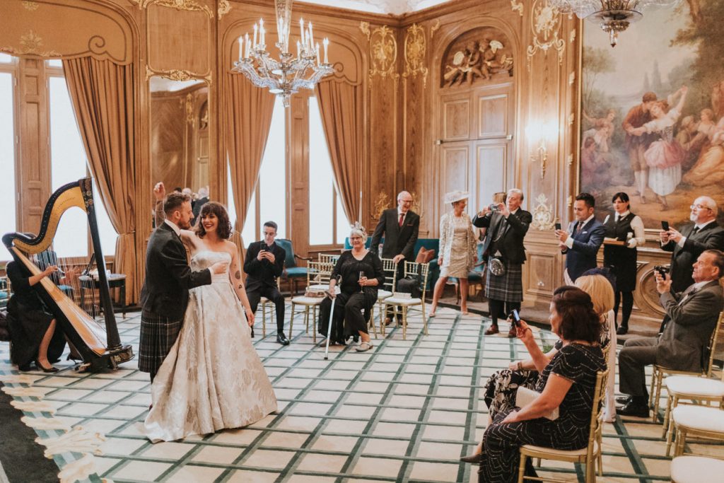 Harpist plays to room of guests