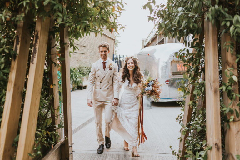 Bride and groom arriving at - AMP Studios - Asylum Chapel London Alternative Wedding Photographer- We Heart Pictures