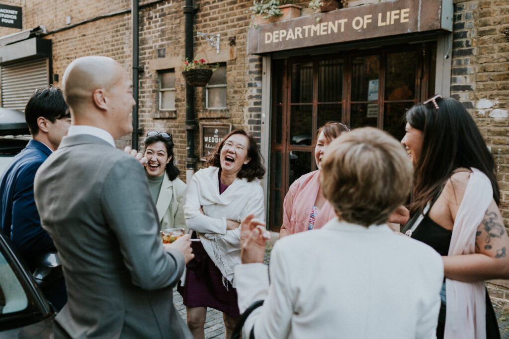 Wedding guest having fun, natural candid photography- Clapton Country Club Wedding Photographer_The Department of Life Wedding